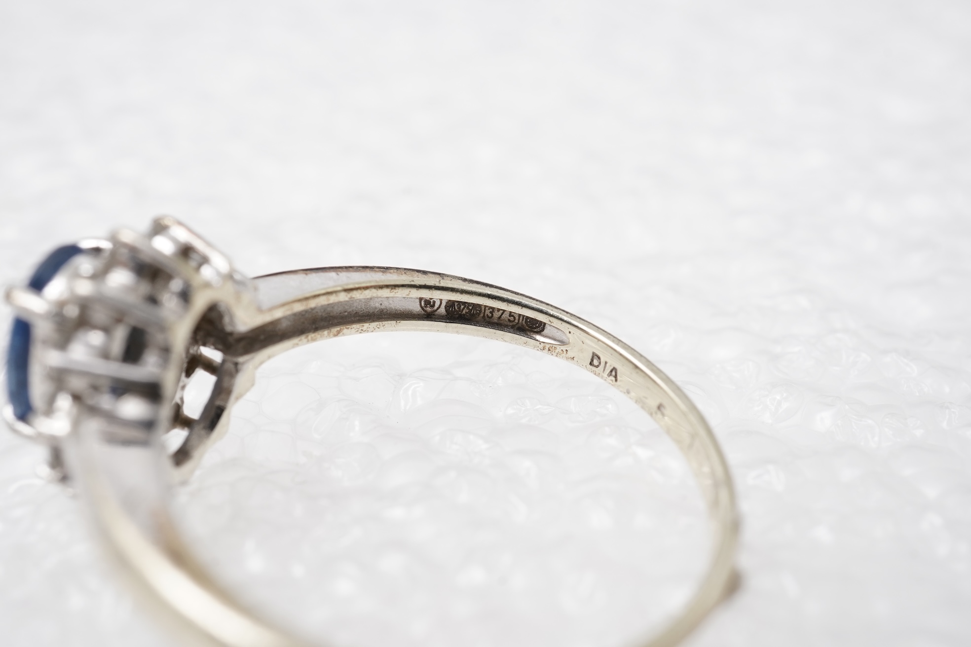 A sapphire and diamond cluster ring